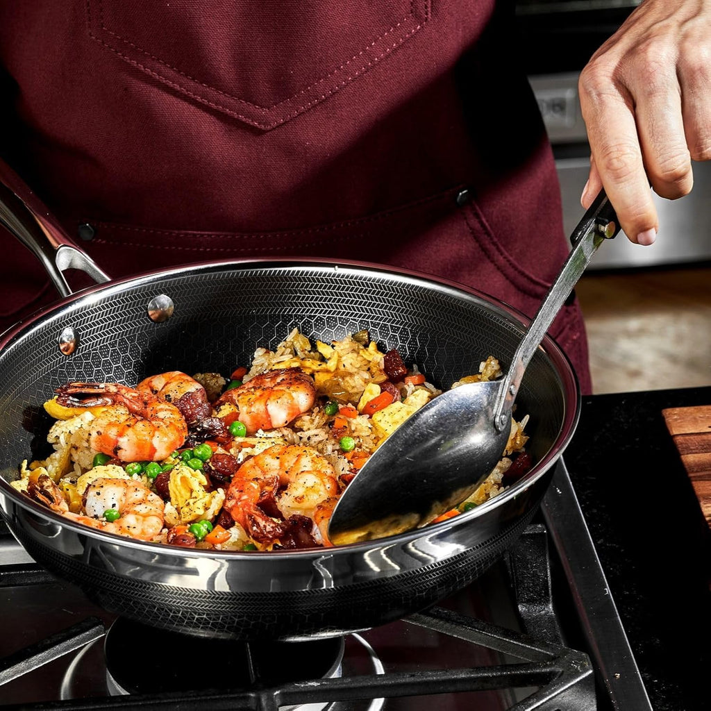 HexClad Hybrid Nonstick 7-Piece Cookware Set, 8", 10", and 12" Pans with Lids, and 10" Wok, Stay-Cool Handles, Dishwasher and Oven-Safe, Induction Ready, Compatible with All Cooktops